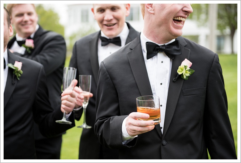 Groom enjoys drink after ceremony | Wentworth by the Sea wedding New Hampshire LAD Photography