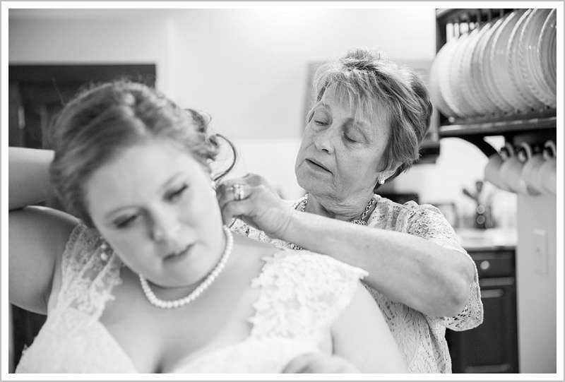 Mother Helping bride get ready - Jason and Angela's Hardy Farm Wedding in Fryeburg Maine