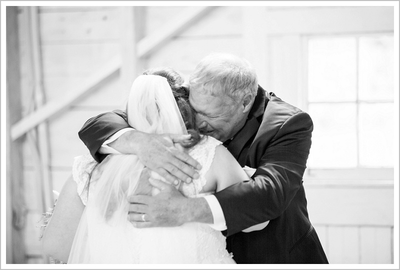 Father of the bride hugs bride - Jason and Angela's Hardy Farm Wedding in Fryeburg Maine