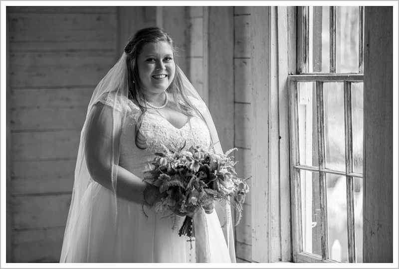 Bride near window - Jason and Angela's Hardy Farm Wedding in Fryeburg Maine