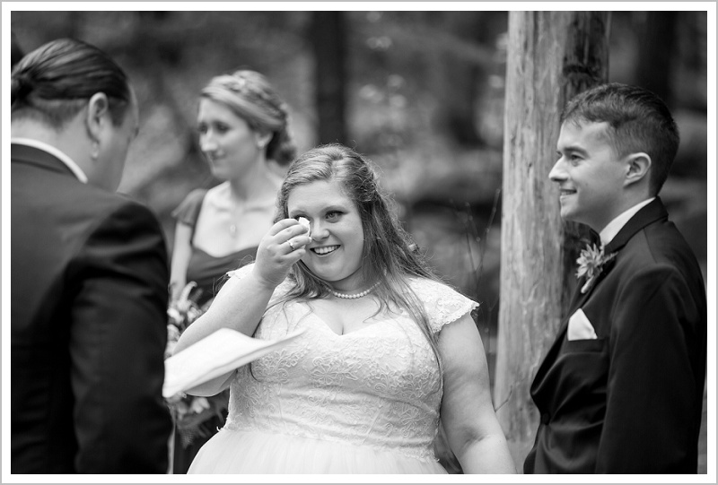 Bride crying during ceremony - Jason and Angela's Hardy Farm Wedding in Fryeburg Maine