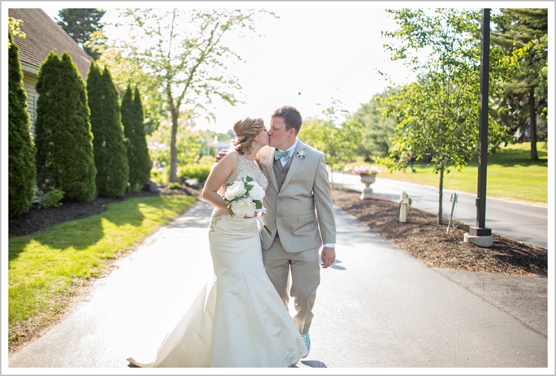 Bride and groom kiss | Joseph and Breanne's Village by the Sea Wedding