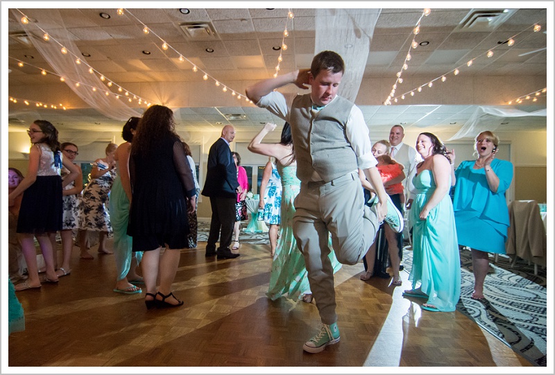 Groom getting down | Joseph and Breanne's Village by the Sea Wedding