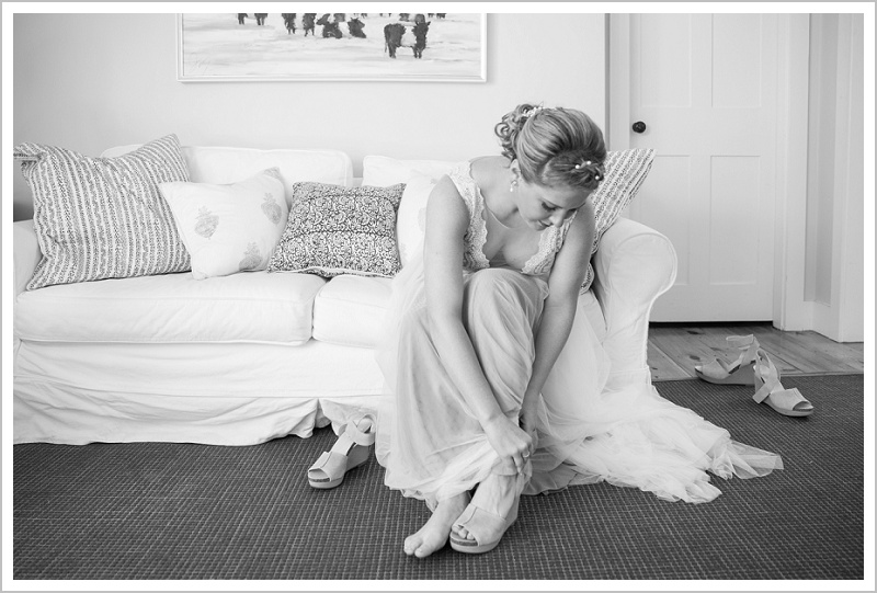 Bride putting shoes on - Adam & Ali's Wedding at The Barn at Walnut Hill | LAD Photography