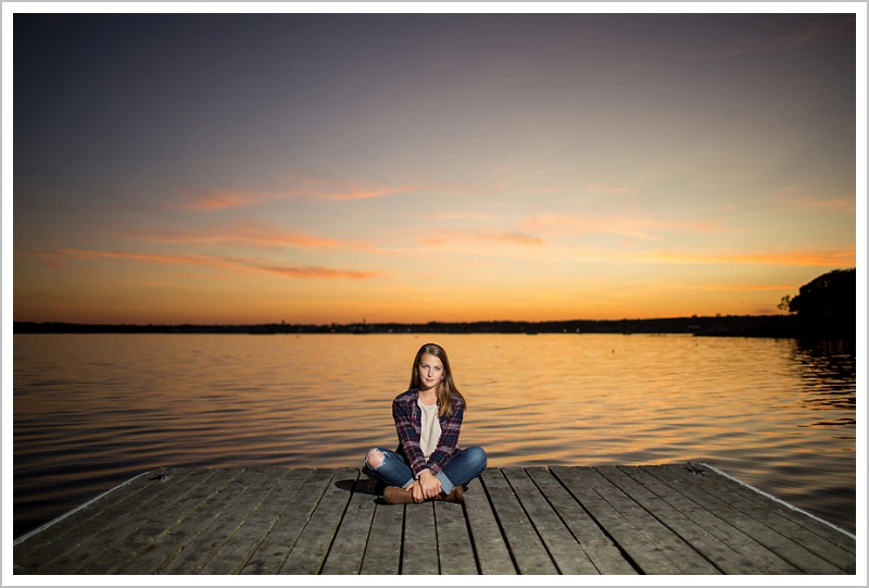 Oceanna in Flannel sitting on the dock. Edward Little Senior Class of 2018