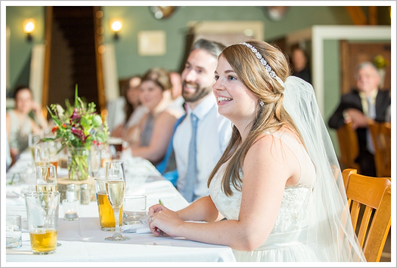 Tyler + Leanne Wedding at Stone Mountain Arts Center - Bride at table