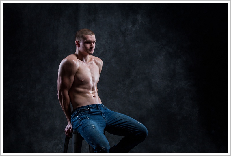 Fitness Fanatic Alex sitting on stool