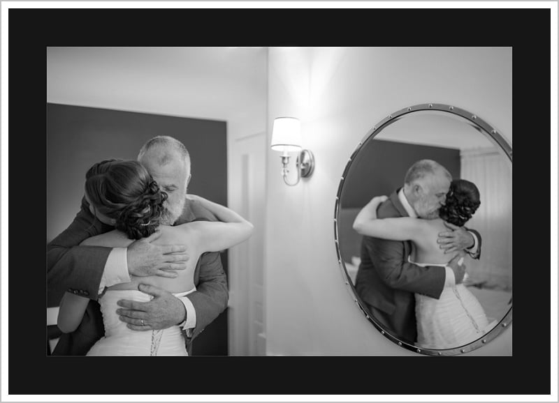 Bride hugging father with mirror reflection - Maine's Top Wedding Photographer