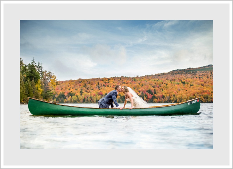 Maine's Bride and Groom in Canoe - Maine's Top Wedding Photographer