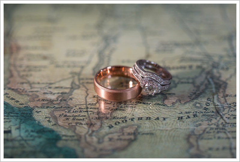 Robert and Morgan's Pemaquid Point Wedding - Rings on a map of Boothbay Harbor - LAD Photography