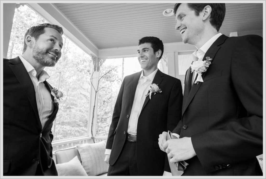 Katie and James' Hidden Pond Wedding | Groom and Groomsman have a laugh