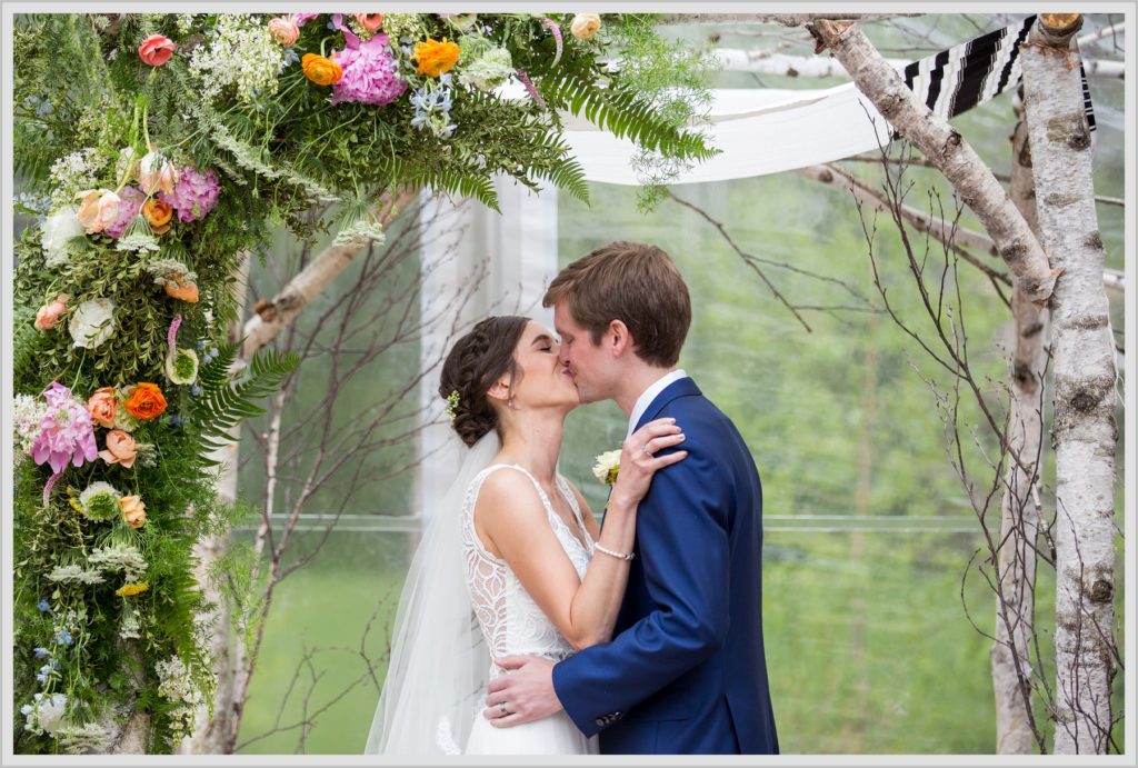 Katie and James' Hidden Pond Wedding | First kiss