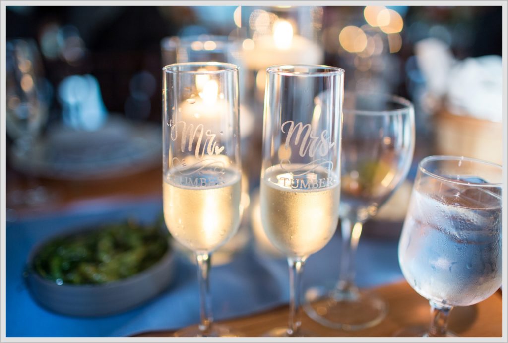 Katie and James' Hidden Pond Wedding | Mr. and Mrs. Champagne flutes