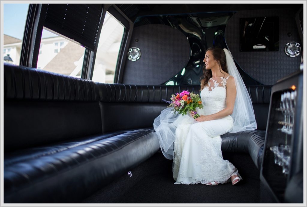 Dan and Amanda's Stone Mountain Arts Center Wedding Featured in Real Maine Weddings | Bride in limo