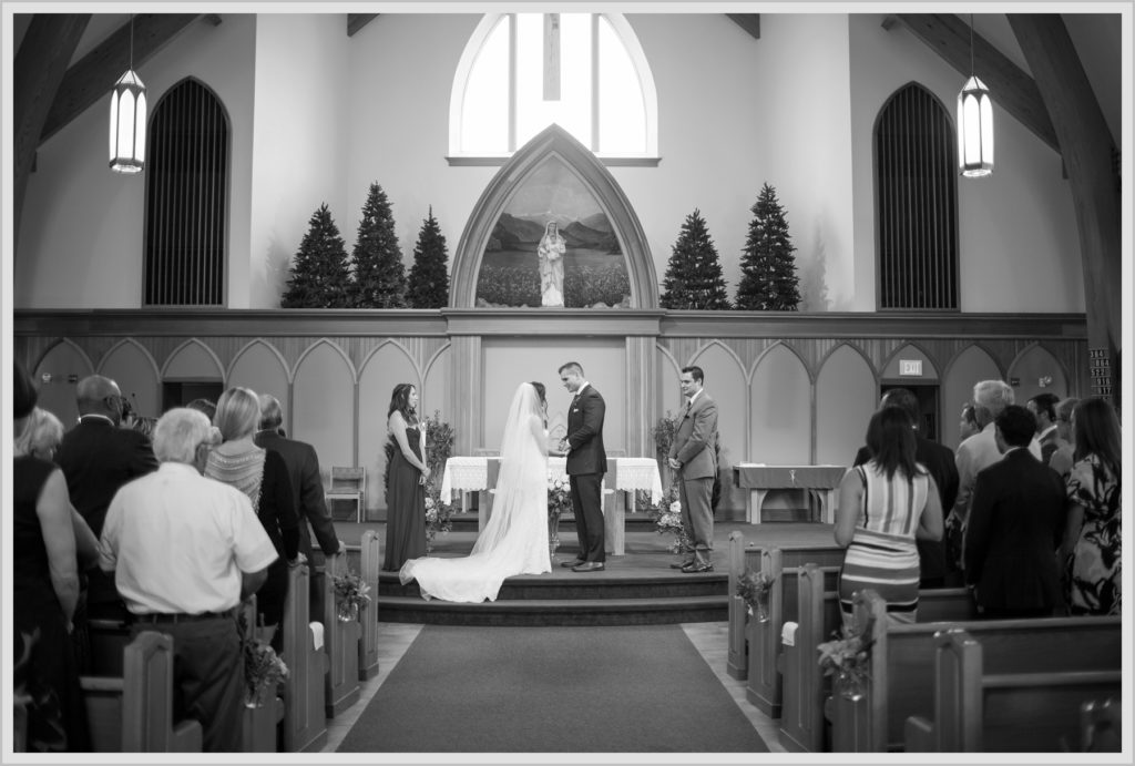 Dan and Amanda's Stone Mountain Arts Center Wedding Featured in Real Maine Weddings | On the alter