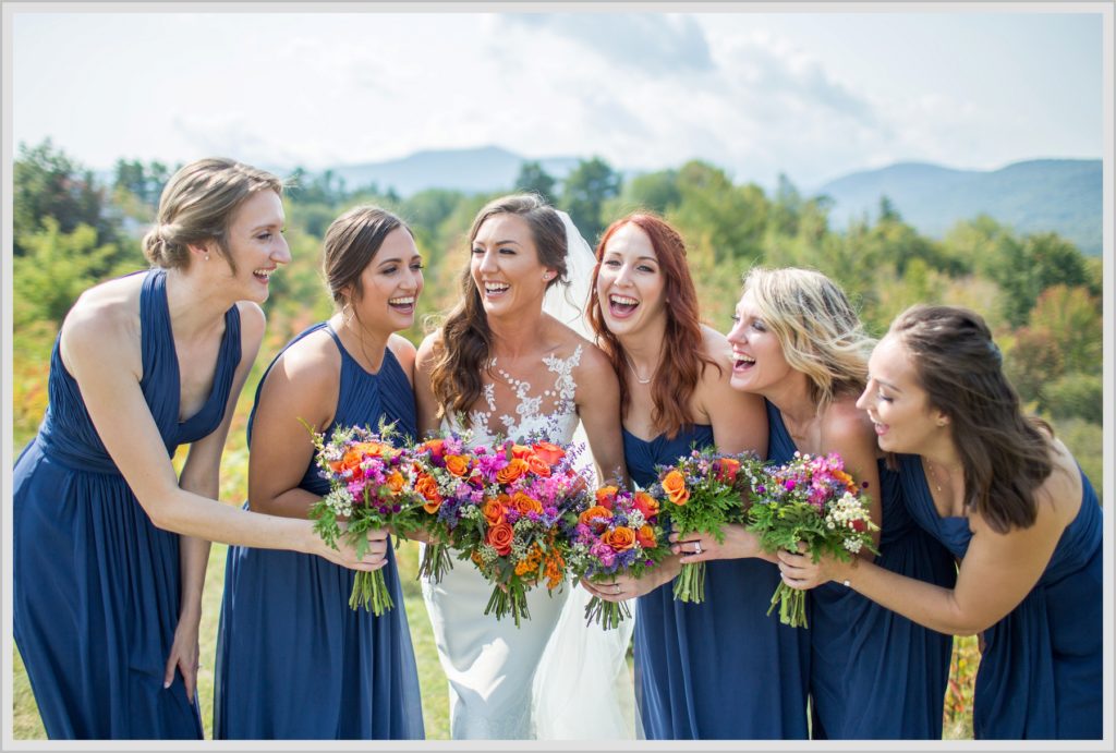 Dan and Amanda's Stone Mountain Arts Center Wedding Featured in Real Maine Weddings | bride and bridesmaids outside