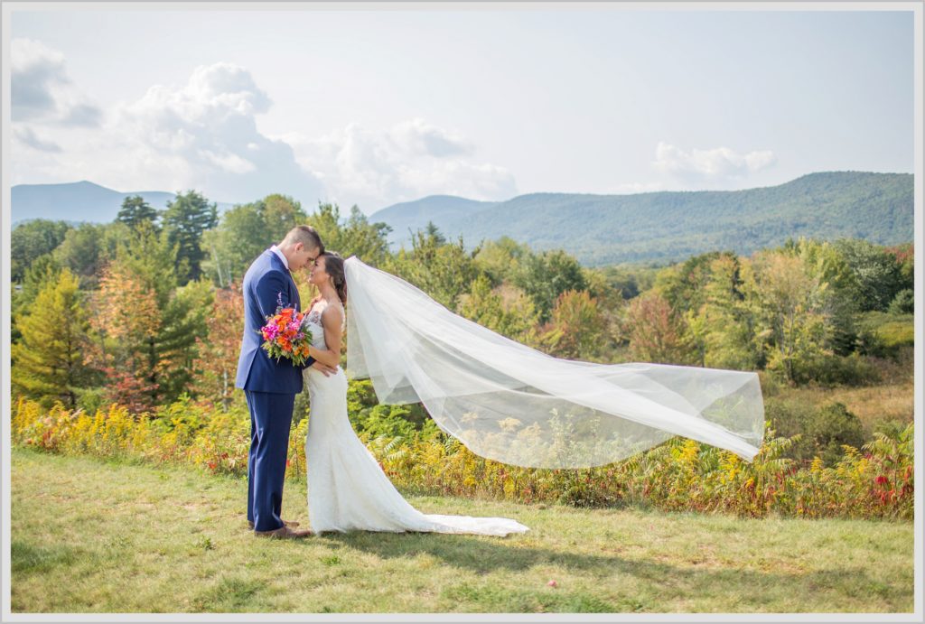 Dan and Amanda's Stone Mountain Arts Center Wedding Featured in Real Maine Weddings | bride and groom with flowing vail