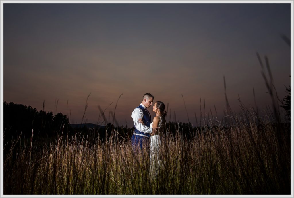 Dan and Amanda's Stone Mountain Arts Center Wedding Featured in Real Maine Weddings | Bride and groom at sunset