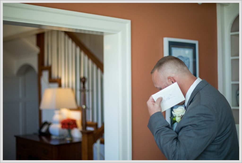 Sean and Nicole Married at York Harbor Inn |groom with note from bride