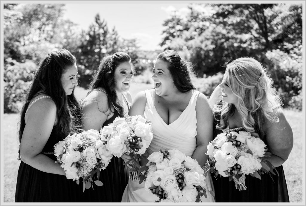 Sean and Nicole Married at York Harbor Inn | bride and bridesmaids laughing