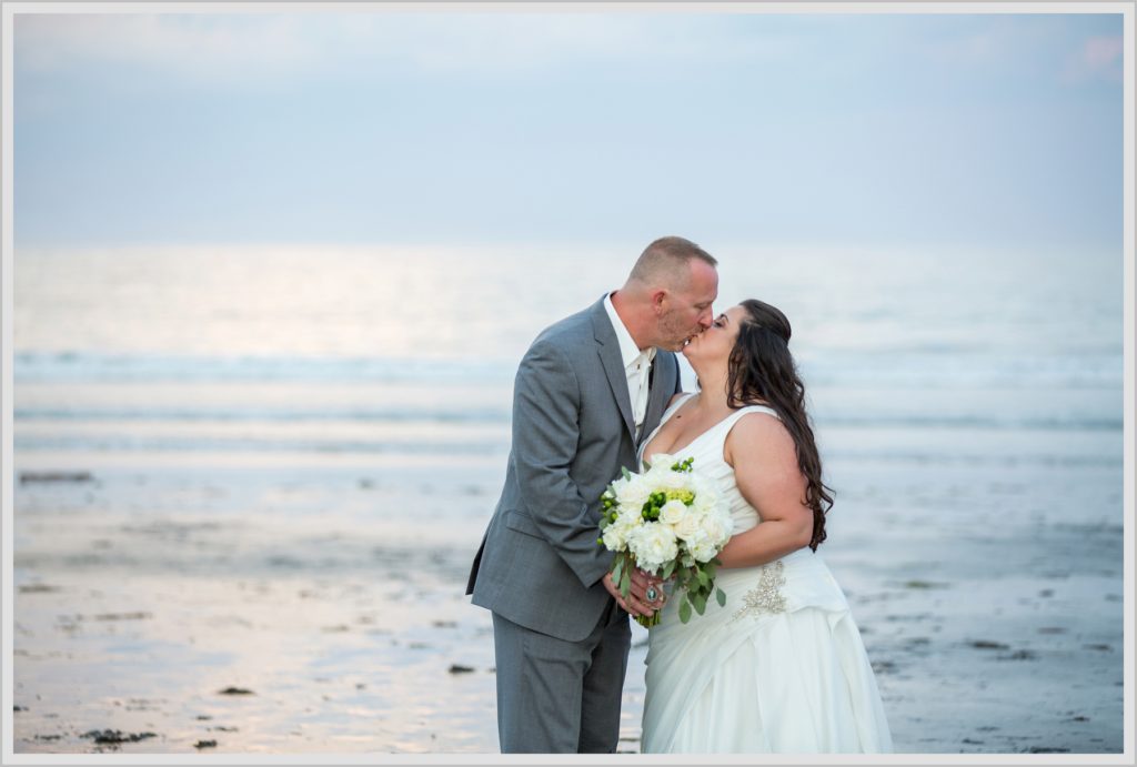 Sean and Nicole Married at York Harbor Inn | bride and groom kissing on the beach