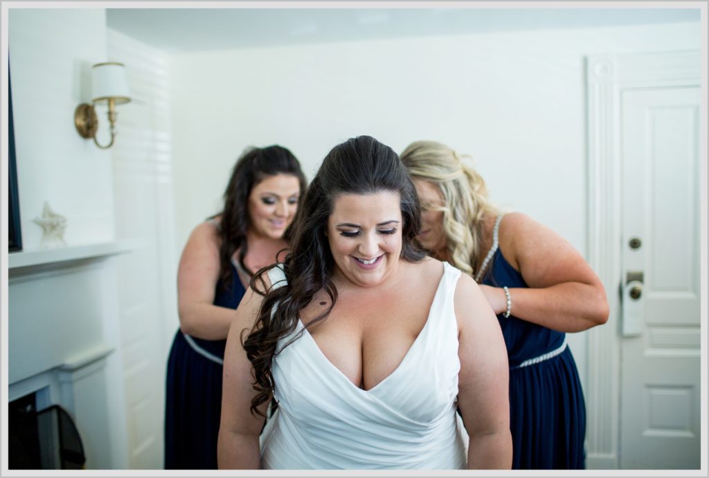 Sean and Nicole Married at York Harbor Inn | getting the dress on