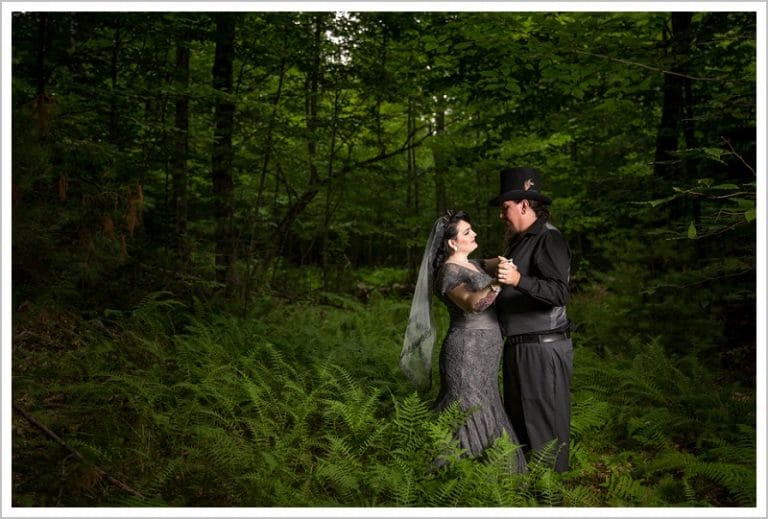 Bride and groom in woods