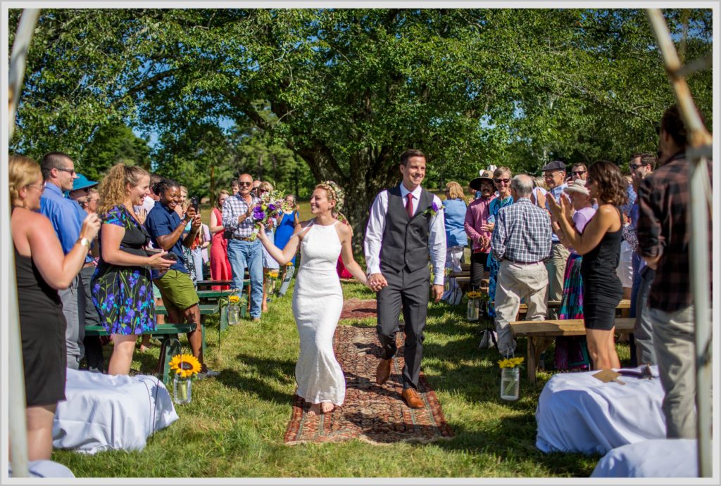 Ryan and Becca's New Hampshire Farm Wedding | Down the aisle together