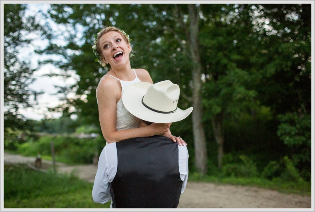 Ryan and Becca's New Hampshire Farm Wedding | Groom picking up Bride