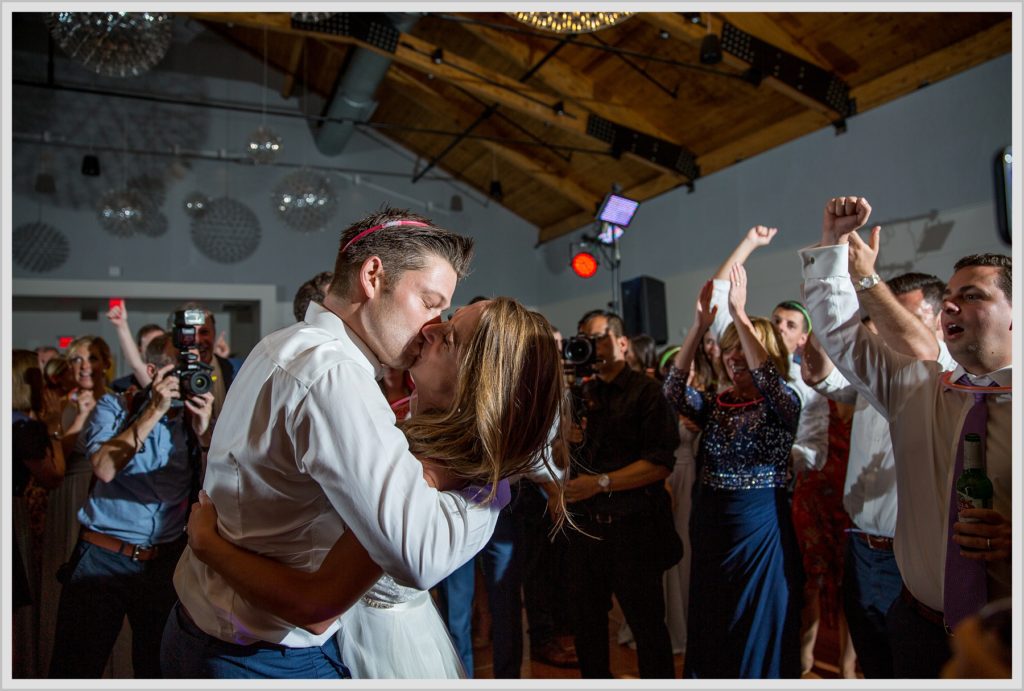 Brian + Tracy's Cliff House Wedding | Kiss on the dancefloor