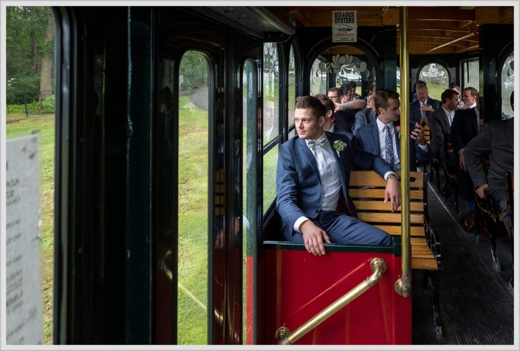 Brian + Tracy's Cliff House Wedding | Groom and groomsmen in trolly