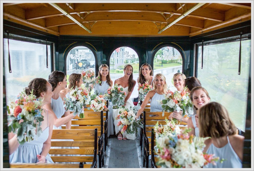 Brian + Tracy's Cliff House Wedding | Bride and Bridesmaids in trolly