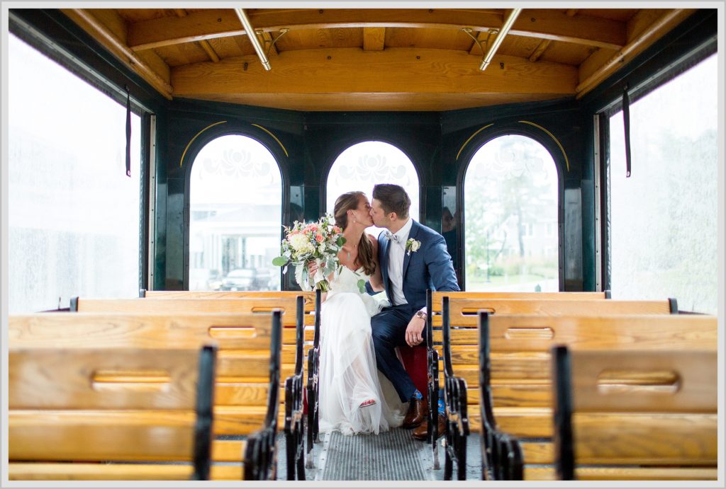 Brian + Tracy's Cliff House Wedding | Kiss in the back of the trolly