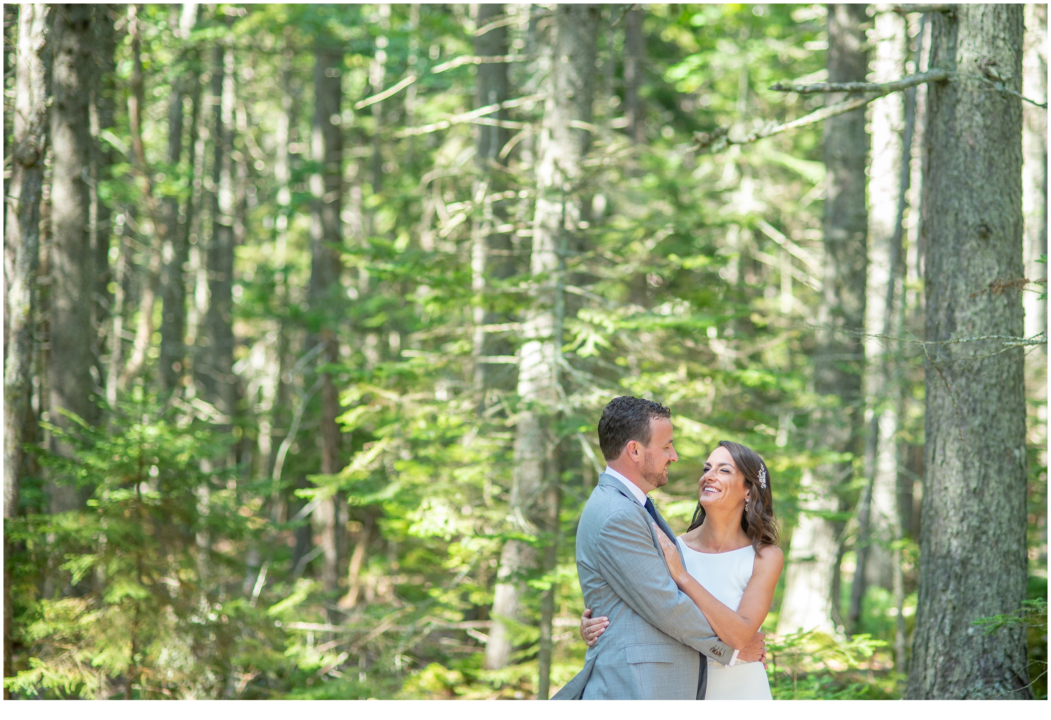 Marc and Kristinas Boothbay Harbor, Spruce Point Inn Wedding | bride and groom in the woods of Maine