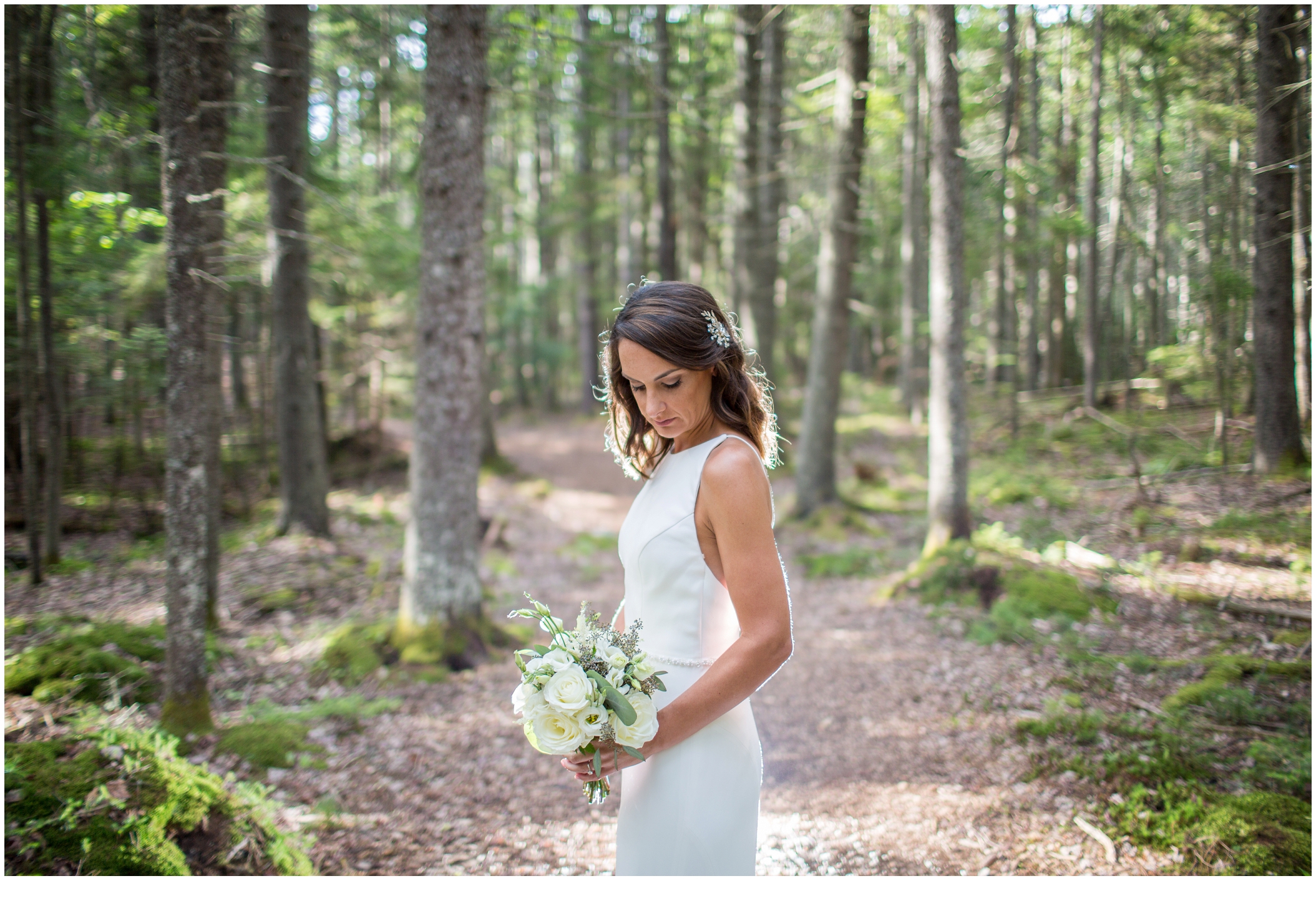 Marc and Kristinas Boothbay Harbor, Spruce Point Inn Wedding | bride in woods of Maine