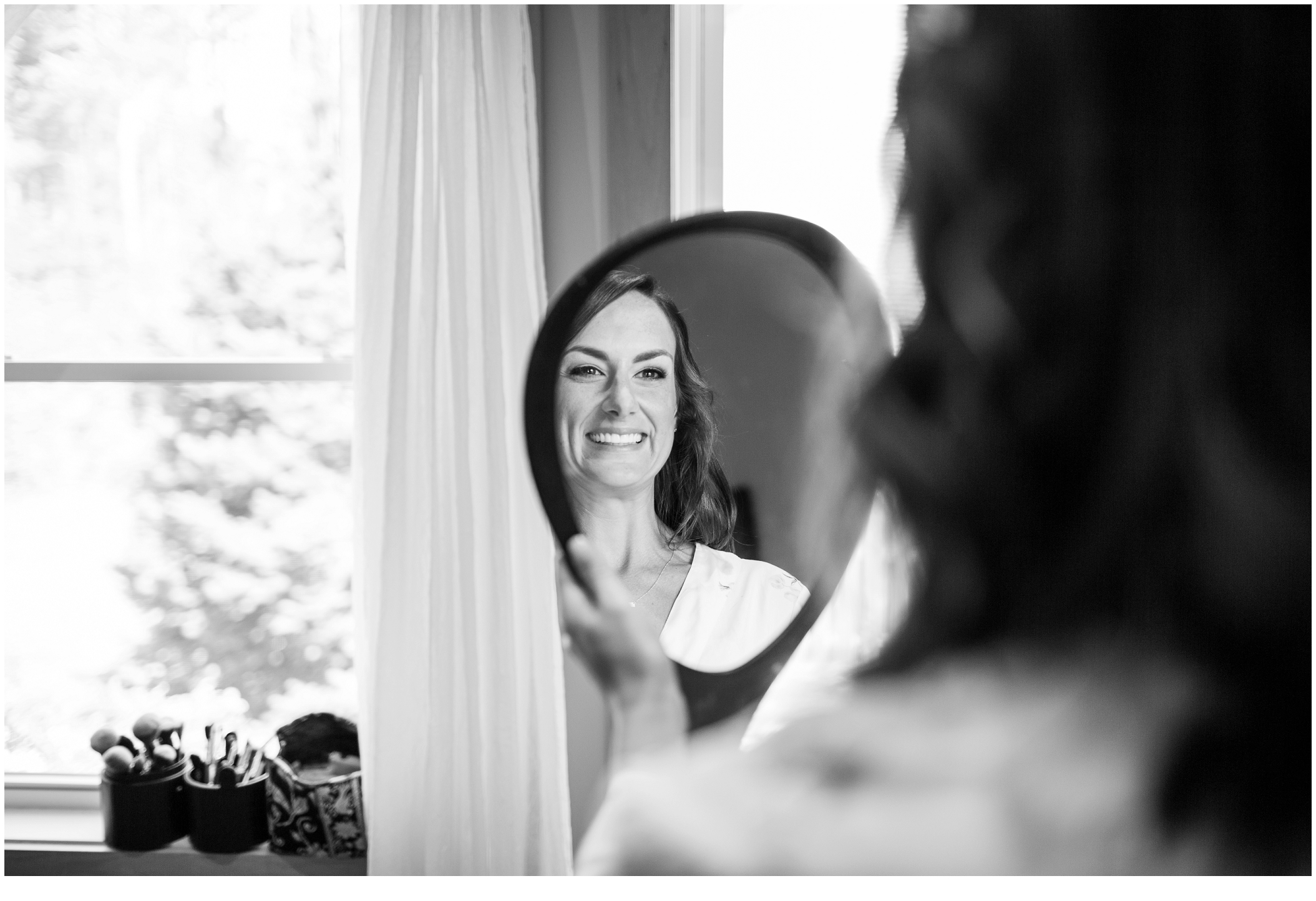 Marc and Kristinas Boothbay Harbor, Spruce Point Inn Wedding | Bride and handheld mirror