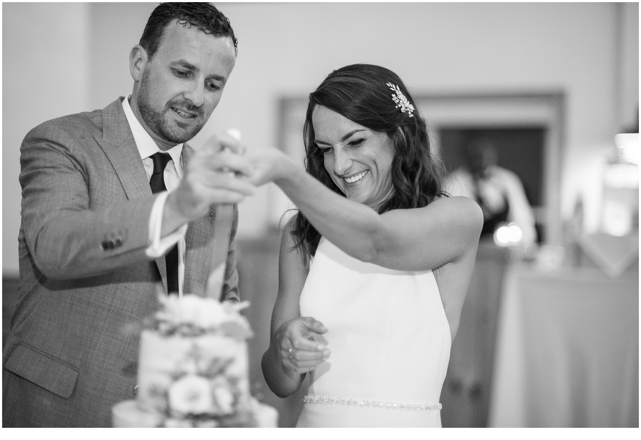 Marc and Kristinas Boothbay Harbor, Spruce Point Inn Wedding | cutting the cake