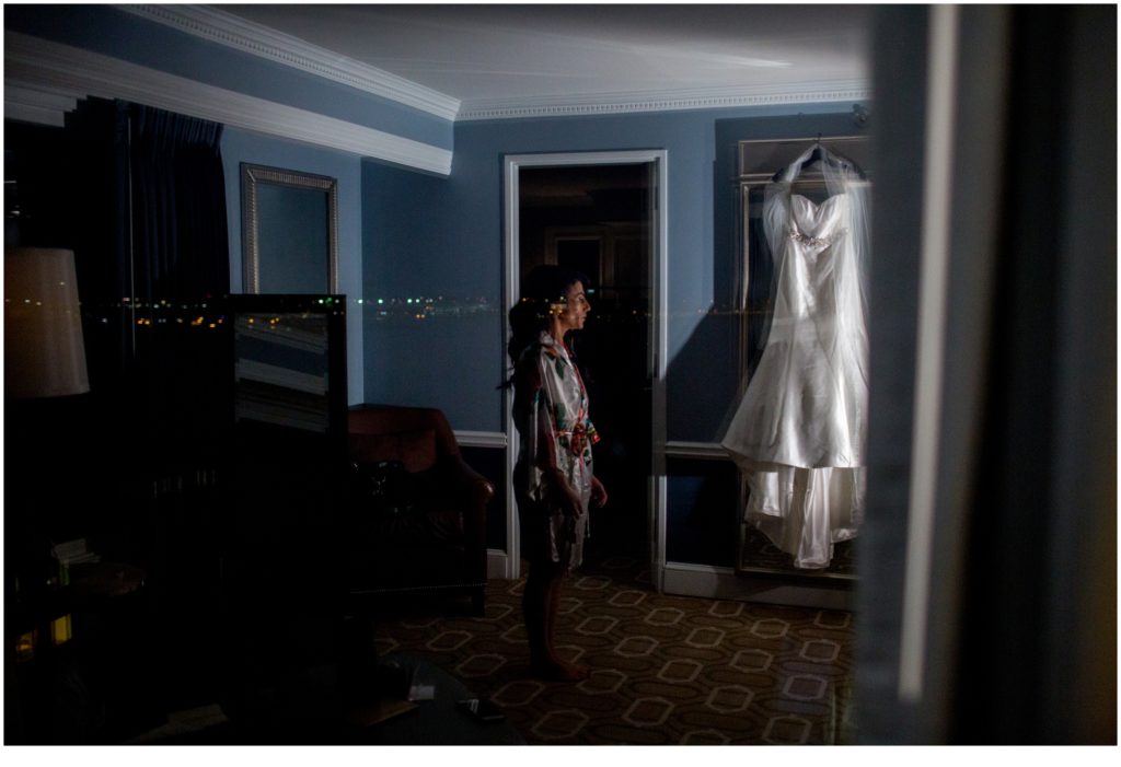 Bride and dress hanging | Jewish Wedding at Boston Harbor Hotel on New Years Eve