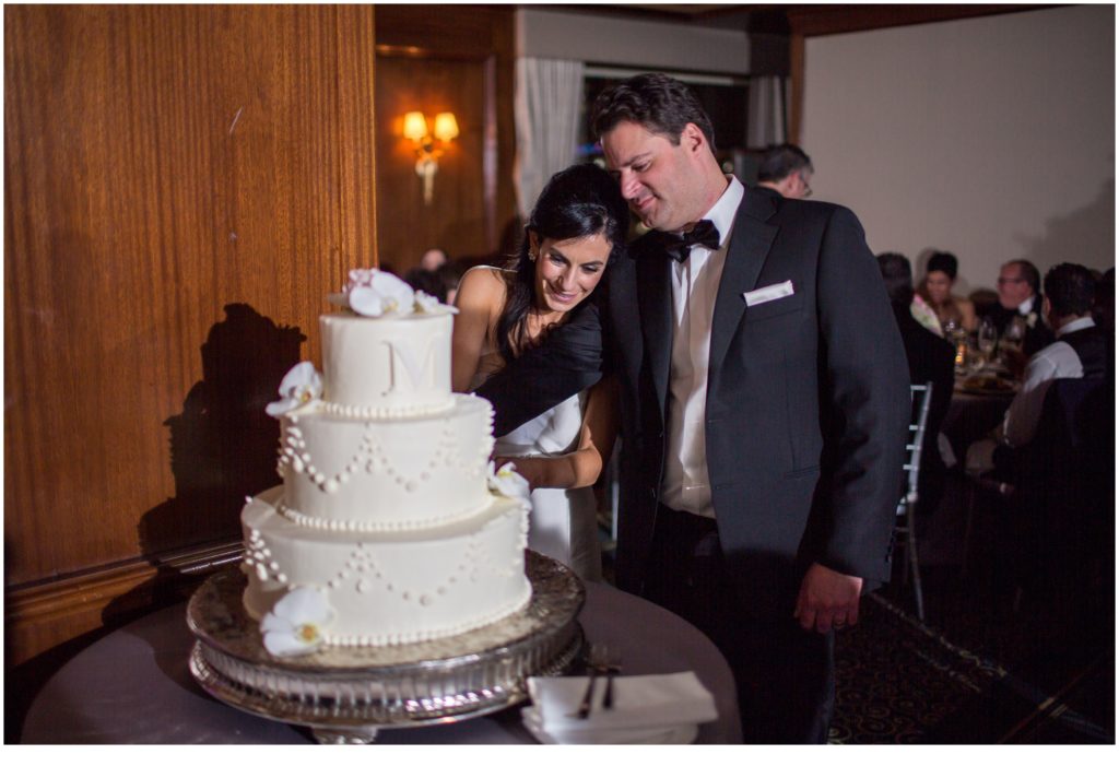 cutting the cake | Jewish Wedding at Boston Harbor Hotel on New Years Eve